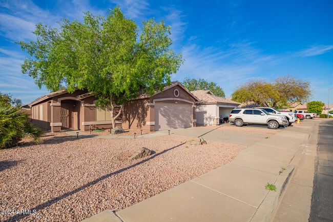 Building Photo - 14954 W Country Gables Dr
