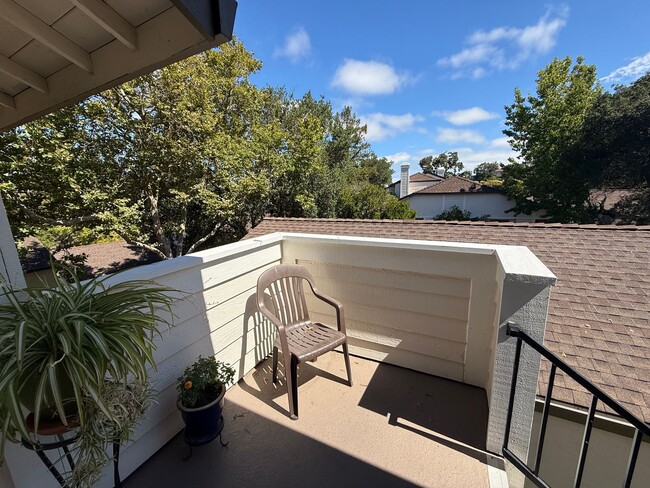 Building Photo - UPPER END UNIT TWO BED / TWO BATH CONDO IN...