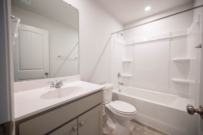 Building Photo - Brand new 4-bedroom / 3 Bath with a main-l...