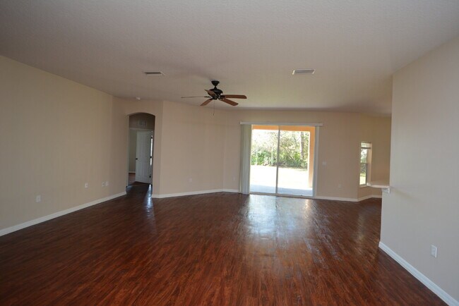 Building Photo - "Spacious 4-Bed Oasis in Palm Coast with 2...