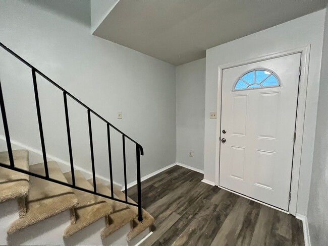 Building Photo - Three-bedroom, two-and-a-half bathrooms in...