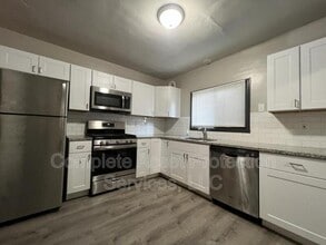 Building Photo - 1119 E 39th Pl
