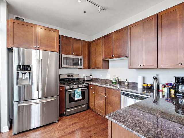 Foto del edificio - 233 E 13th St