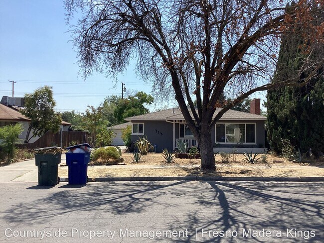 Building Photo - 3 br, 2 bath House - 313 W. Robinson Avenue