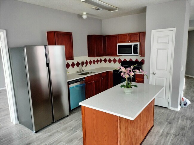 Foto del edificio - 14930 Sugarhollow Dr