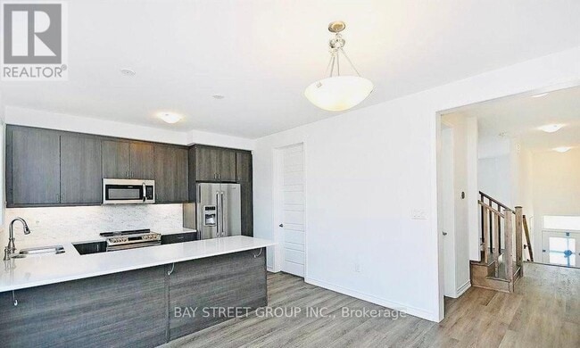 Photo du bâtiment - 980 Logan Dr