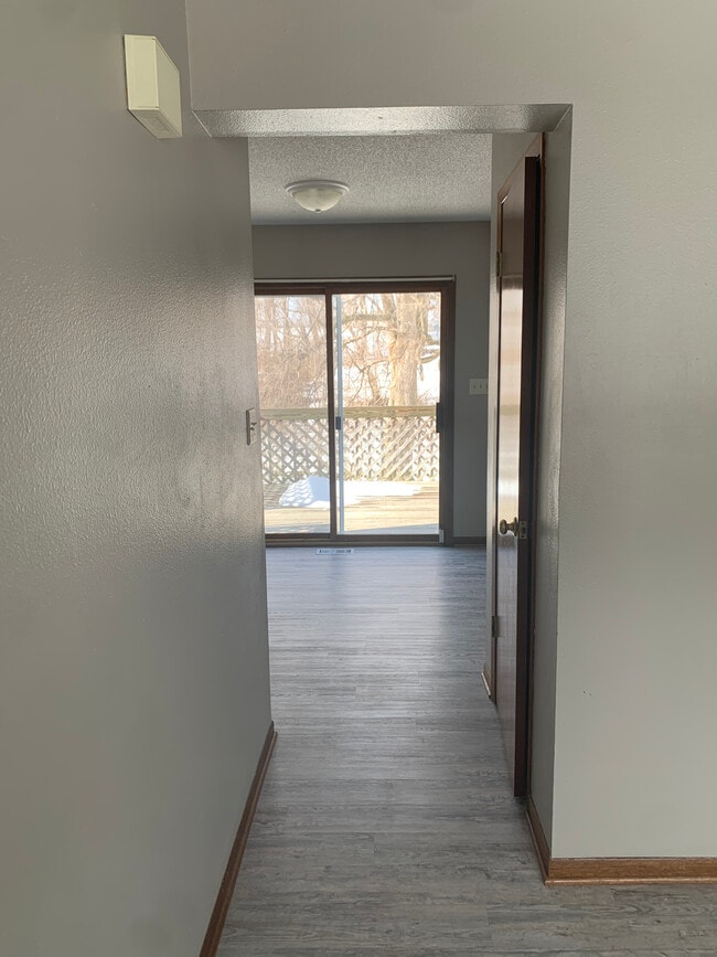 Hallway from living room to kitchen / dining area - 2454 Indianola Ave