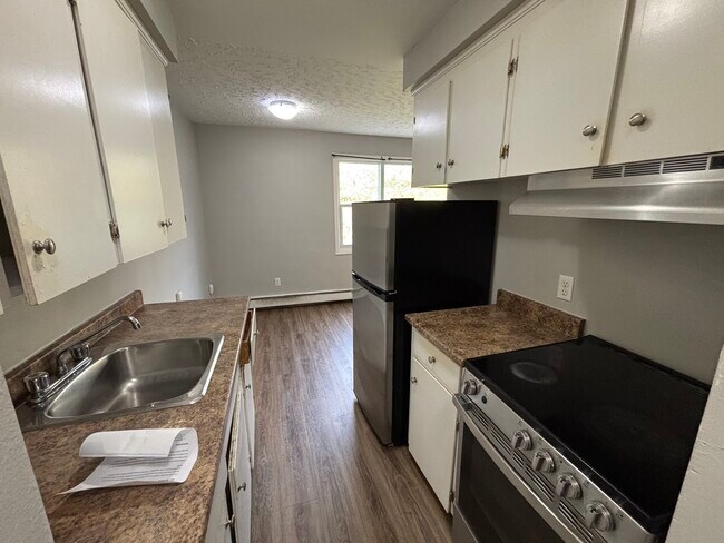 Photo du bâtiment - Charming Unit for Lease