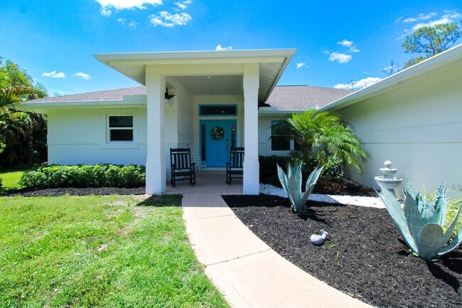 Building Photo - Spacious Private Pool Home with RV/Boat and Trailer Storage – OFFERED UNFURNISHED -- Available fo...