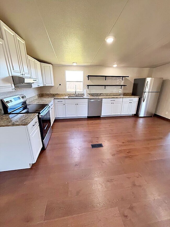 Foto del edificio - Beautiful 4 Bedroom 2 Bath manufactured home in Rhome Texas on 2 acres.