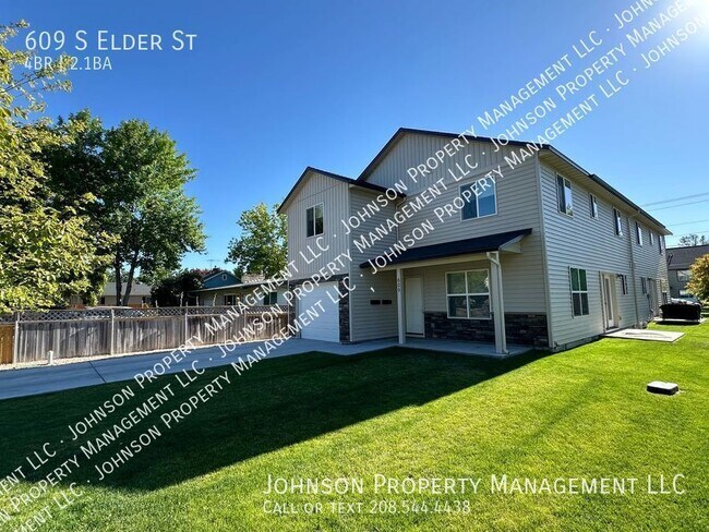 Building Photo - Spacious and Charming 4-Bedroom Duplex in ...