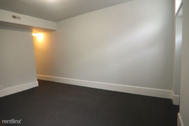 Foto del edificio - 6 br, 2 bath Townhome - 1221 N Bond St