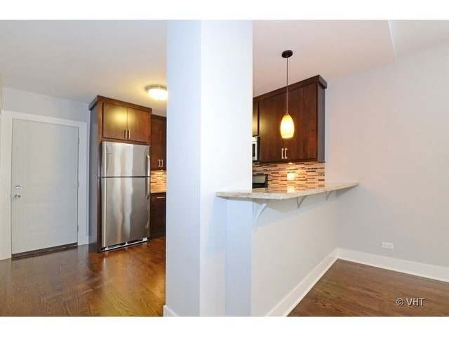 kitchens w/ mocha cabinetry, granite counters - 4573 N Elston Ave