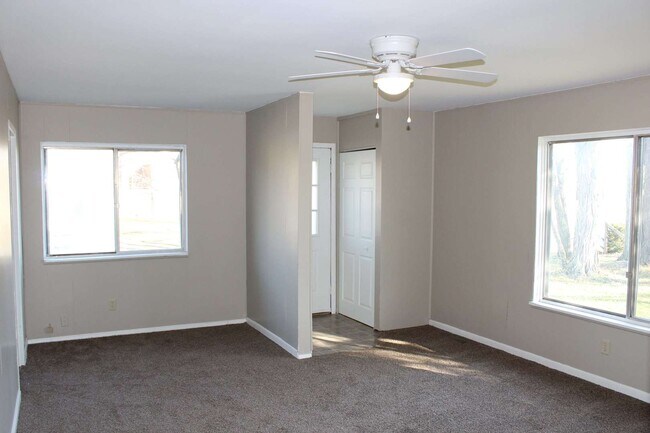 Building Photo - Freshly painted four bedroom ranch.