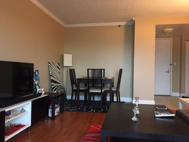 Photo - Spacious Top-Floor 2-Bedroom with Heat Included & Garage Parking! Apartment
