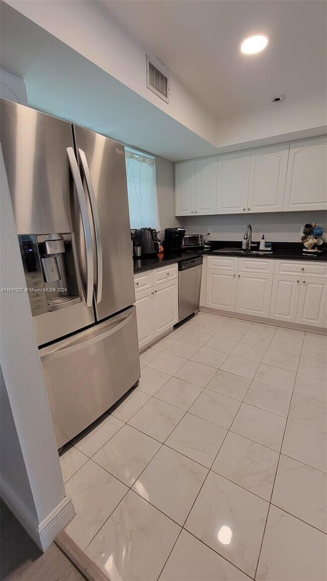 Building Photo - 8900 Collins Ave