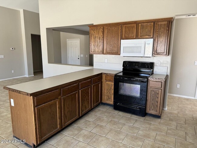 Building Photo - 12502 W Charter Oak Rd
