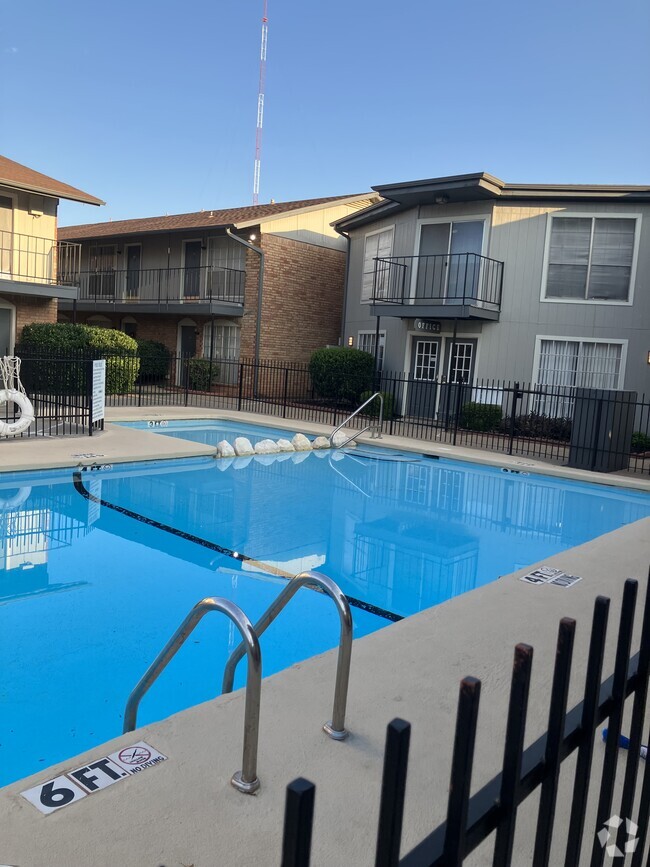 Building Photo - Santa Fe Village & Highlander Apartments