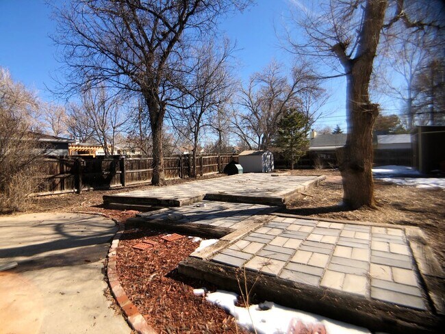 Enjoy outdoors in the fully fenced backyard! - 7590 Bradburn Blvd