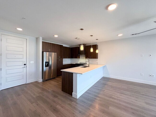 Building Photo - Stylish East Austin Condo with Modern Finishes, Open Living, and Luxury Primary Retreat