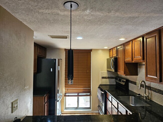 Foto del edificio - Winter Springs Gem: 2 BED 1.5 BATH Two-Story Condo with Amazing Amenities - (BAYTREE 4 CONDOS)