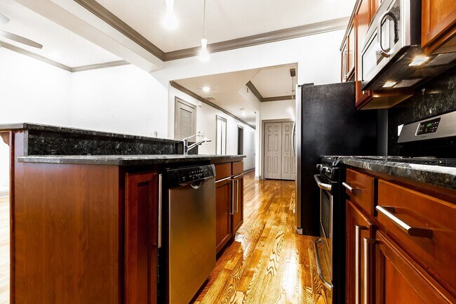 Foto del edificio - 4627 S Langley Ave