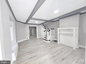 Building Photo - 5011 Larchwood Ave