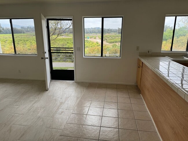 Building Photo - Charming 2-Bedroom Duplex on a Tranquil Ho...