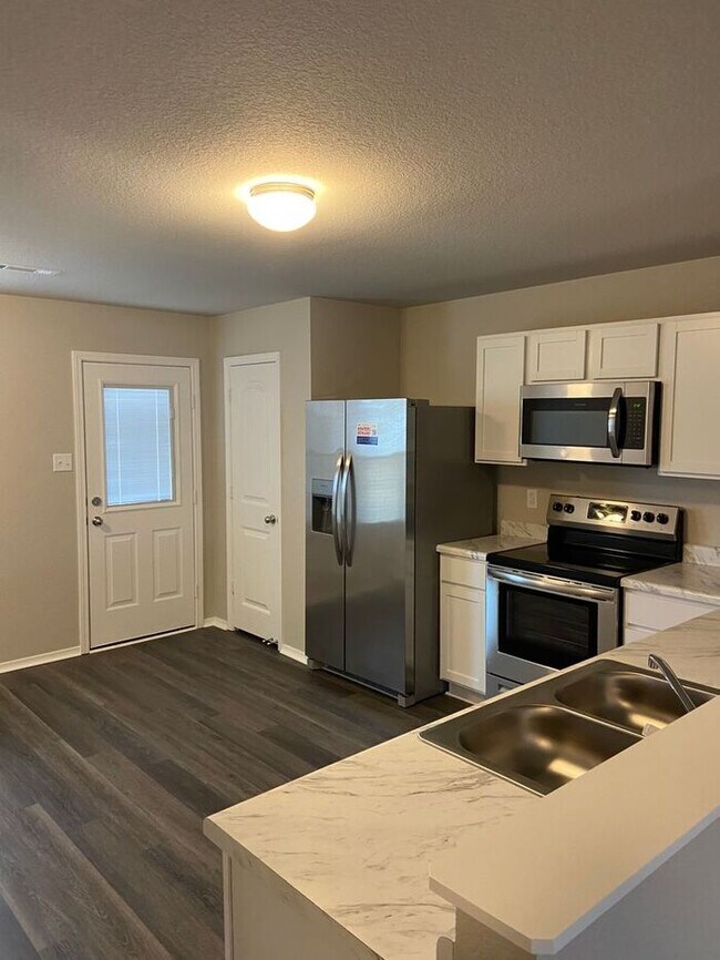 Building Photo - BRAND NEW Four Bedroom | Two Bathroom Home...