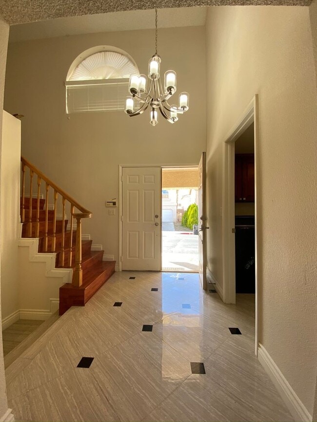 Building Photo - This great home with available with 3 car ...