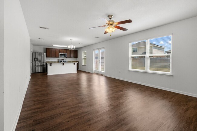 Building Photo - OPEN CONCEPT 4 BED / 2.5 BATH - Community Pool