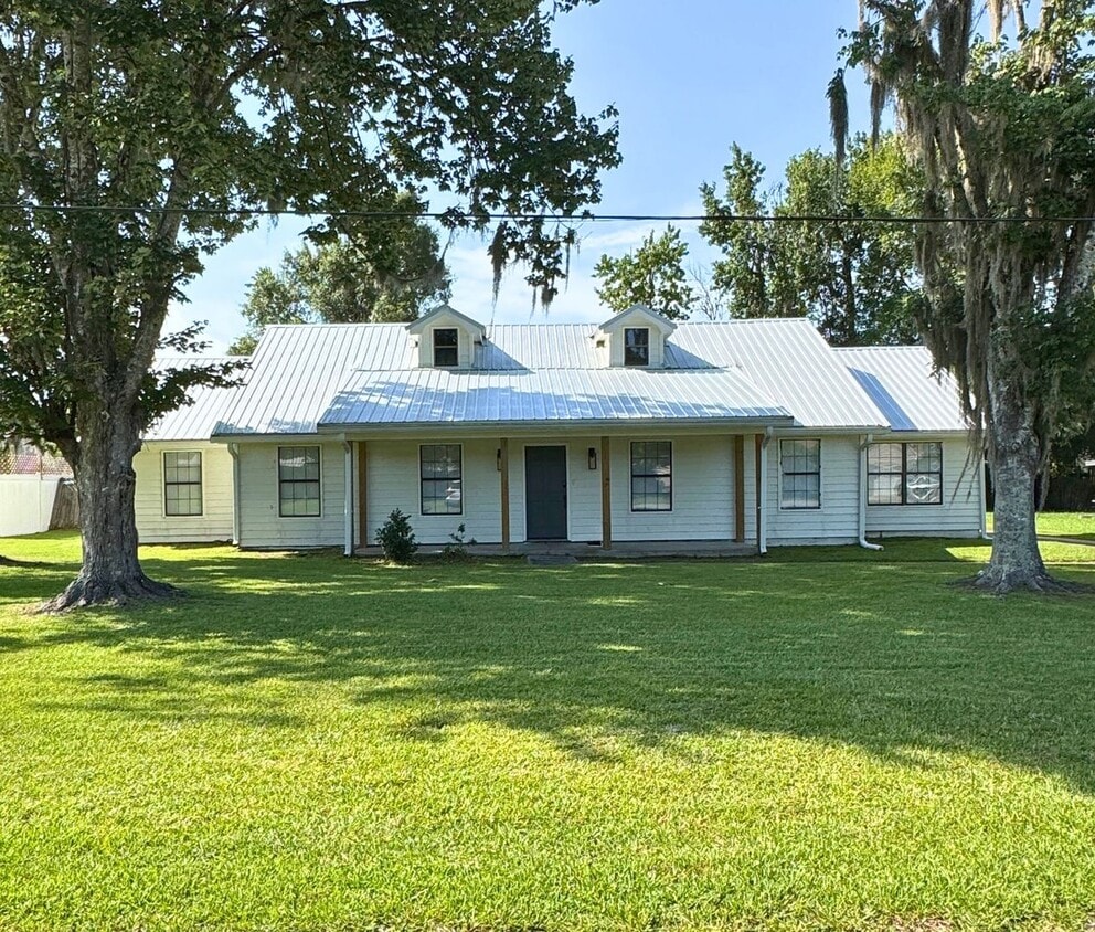 Primary Photo - Spacious 4 Bedroom Home with Flex Room & S...