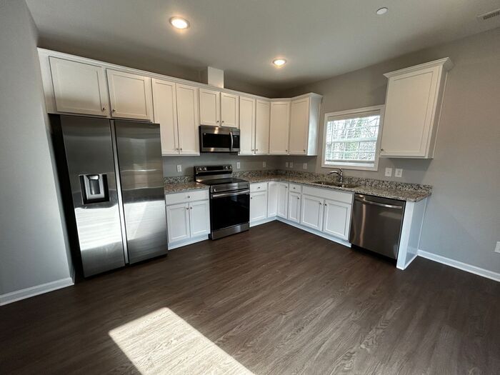 Primary Photo - Beautiful 4-Bedroom Home with Serene Outdo...