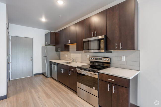 Efficiency with Balcony - 582SF - Kitchen - IA City Lofts