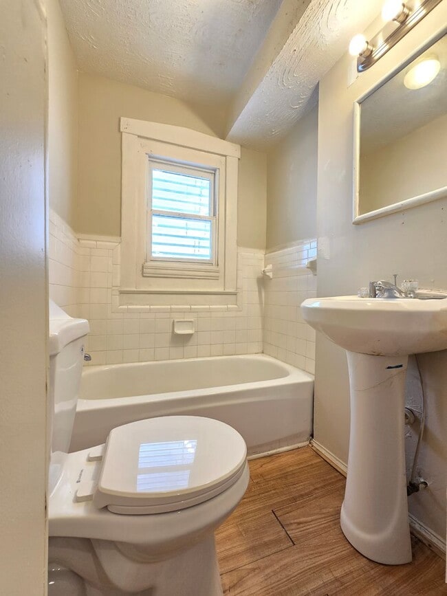 Building Photo - ? Renovated 4-Bedroom Home with Modern Upg...