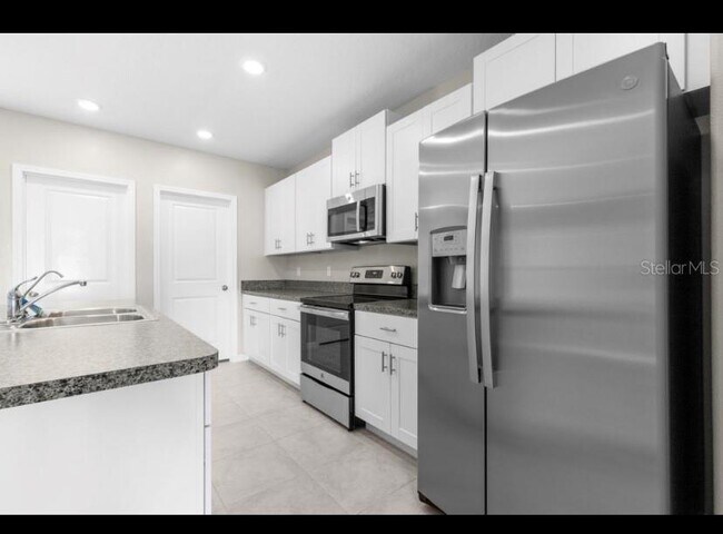 Building Photo - 10228 Amazing Grace Ave