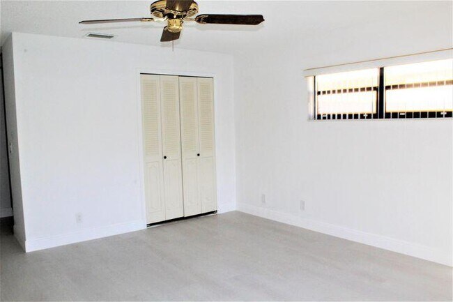 Building Photo - 9775 Tabebuia Tree Dr