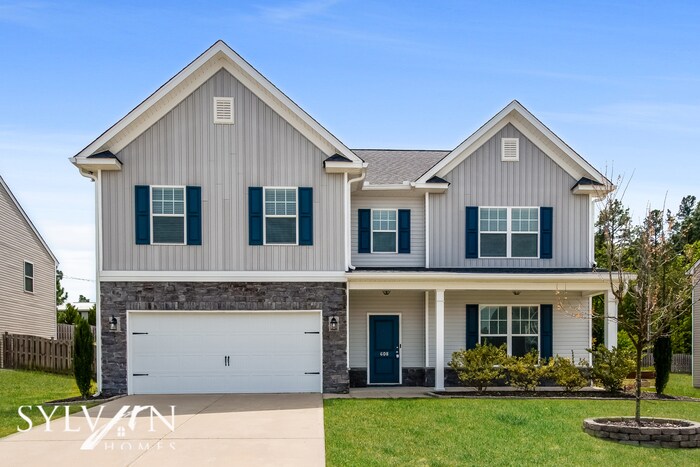 Primary Photo - Embrace the charm of this 4 BR, 2.5 BA home