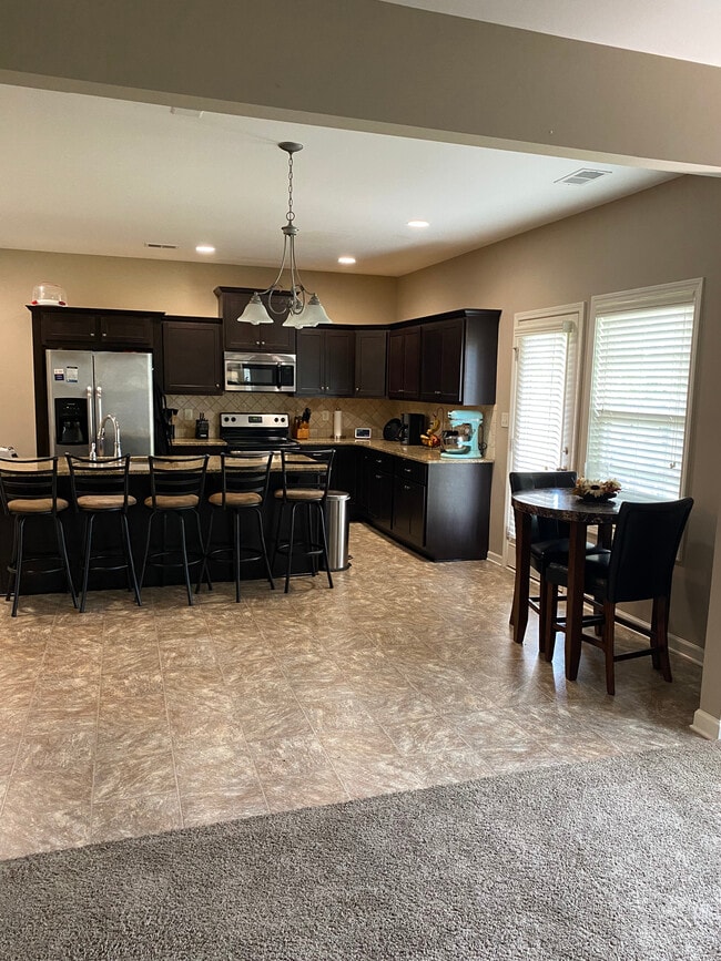 Lots of Island Seating - 414 Rolling Acres Dr