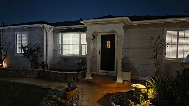 Front Facade - Evening - Perspective view - 16825 S Berendo Ave