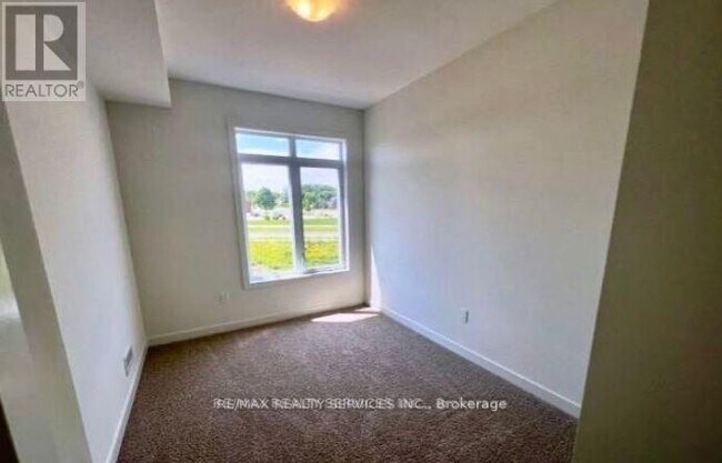 Photo du bâtiment - 405-405 Myers Rd