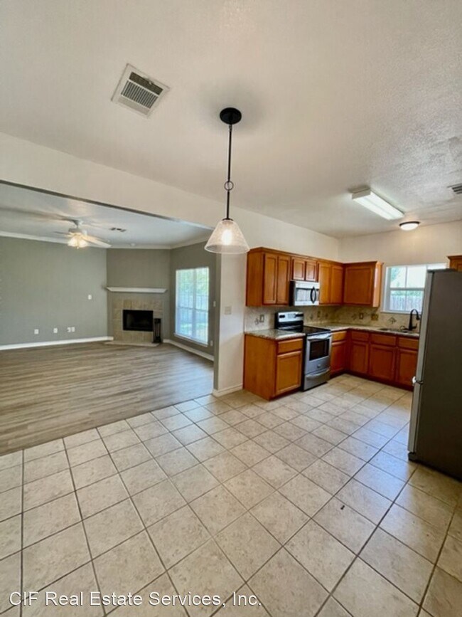 Building Photo - 4 br, 2 bath House - 10317 Peony Ln.
