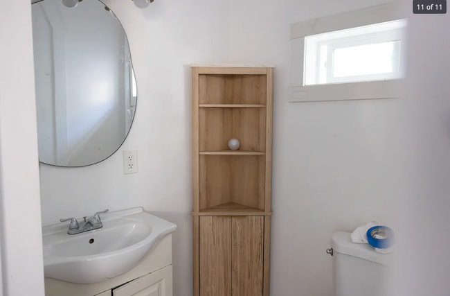 brand new cabinet and real brass light fixture - 1359 Oakwood Dr
