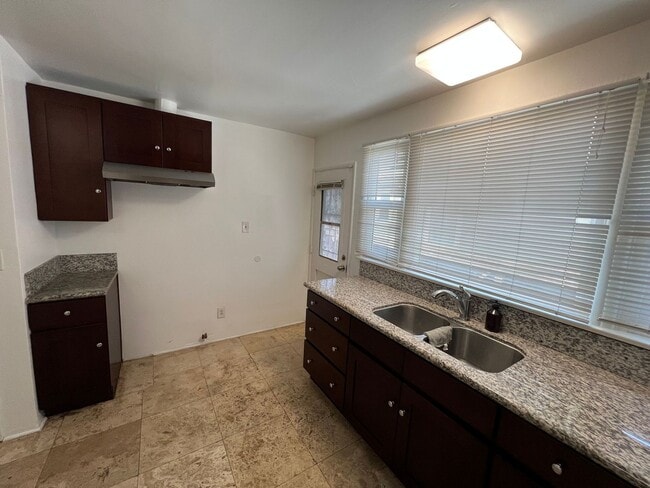 Building Photo - 51st Street Apartments Triplex