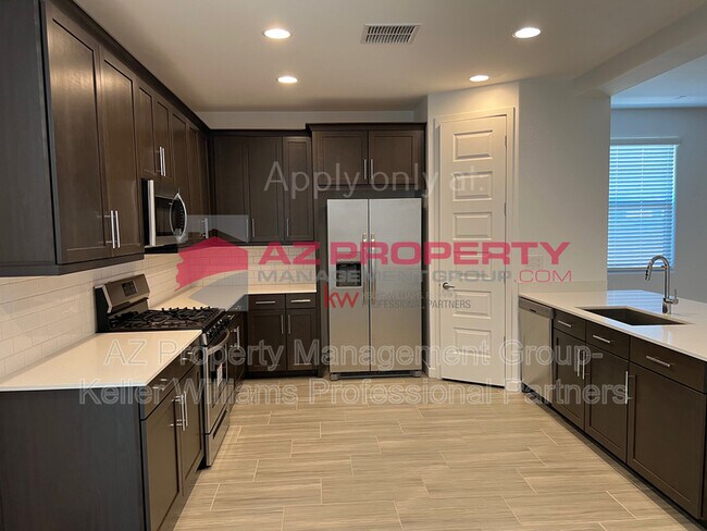 Building Photo - 12481 W Kaler Dr