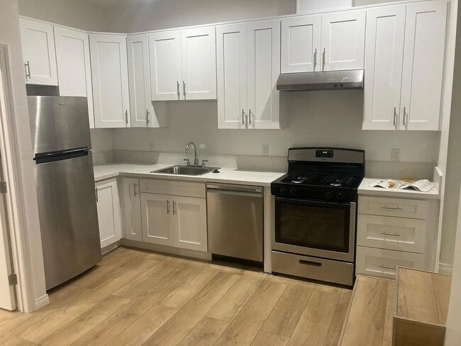 Building Photo - 7465-1-2-Garden-Grove-Ave