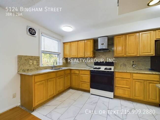 Foto del edificio - 5124 Bingham St