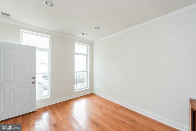 Front door / Living Room - 315 E 25th St