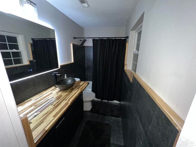 Building Photo - 8100 6 Pence Dr