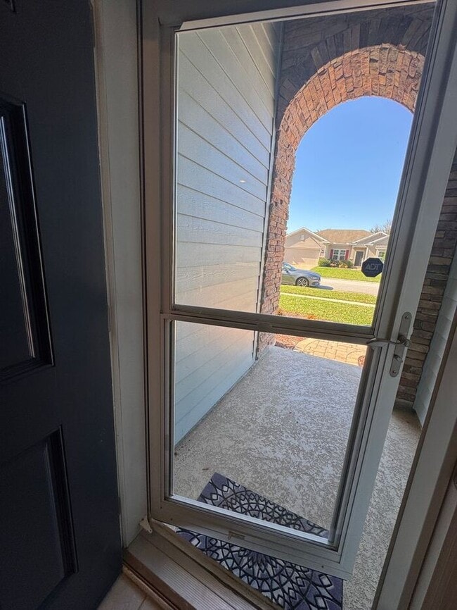 Building Photo - COMING SOON! Beautiful 4BR 3BA Home w/ Screened Lanai & Pond View • Garage Parking • Fenced Yard ...